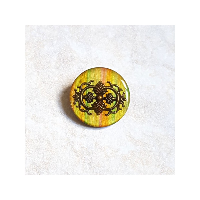 Broche vintage très originale tons mordorés et bronze forme ronde aspect émail