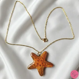 Collier étoile de mer orange à ton feux sur chaîne dorée fabrication artisanale fait main léger